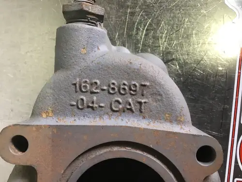 CARCASA DE TERMOSTATO CATERPILLAR 1628697 USADA - Imagen miniatura 2